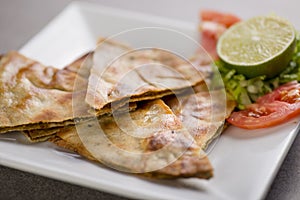 arais shawarma wrap snack with lime and salad served in dish isolated on grey background top view of arabic food