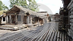 Araisi Lake Castle in Latvia. Historical Wooden Buildings on Small lake Island in the Frozen Lake Araisi in the Winter