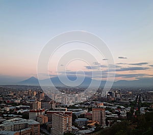 Ararat mountain view at sunset. Summer evening in Yerevan, Armenia. View over capital city