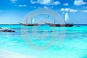 Arashi Beach Aruba West Indies boats catamaran snorkeling turquoise water photo