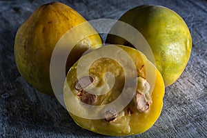 Araza fruits closeup on wood background photo