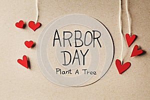 Arbor Day message with small hearts