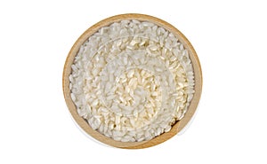 Arborio risotto short grain rice in wooden bowl isolated on white background. nutrition. food ingredient