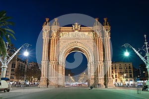 The 'Arc De Triomf' By Night In Barcelona, Spain photo