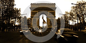 Arc de Triomphe on the Champs Elysees in Paris France with speed