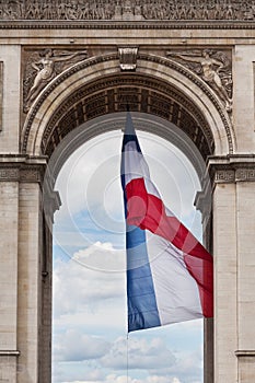 Arc de Triomphe detail and French flag