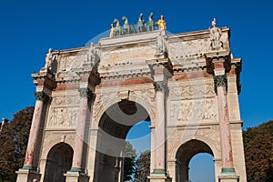 Arc de Triomphe du Carrousel Triumphal Arch at Carrousel Place monument is a tribute to Napoleon`s military victories in Paris