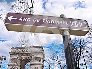 Arc de Triomphe and its street signal Sky background