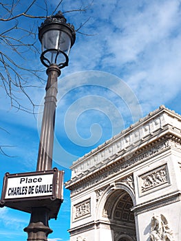 Arc de Triophe Etoile & Street sign Paris France photo