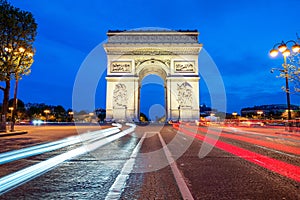 Arc de Triomphe at night in Paris, France