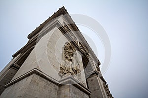 Arc de Triomphe Triumph Arch, or Triumphal Arch on place de l`Etoile in Paris, taken from below.