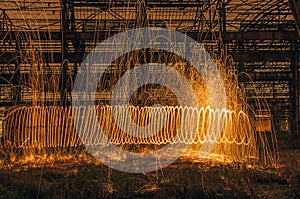 Arc of light from burning steelwool