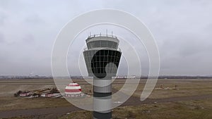 Arc shot of flights management air control tower at international airport