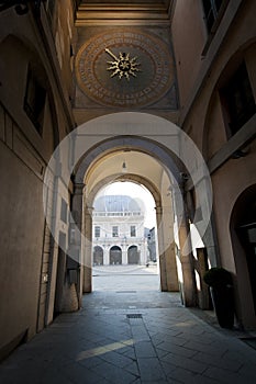 Arc to main square in Brescia with orologio wall clock from th photo