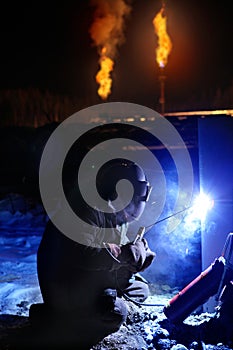 Arc Welder working on the Oil Field