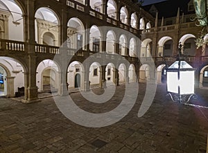 The arcaded inner courtyard of The Styrian Armoury Landhaus building, a masterpiece of the Italian Renaissance, by night, in