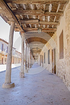 Arcaded street from seventeenth century in Ampudia village photo