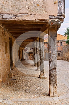 Arcades amd old houses in Calatanazor, Soria, Spain