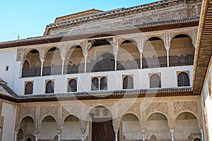 Arcades of the Comares courtyard of the Nasrid palaces of the Alhambra in Granada, Spain.