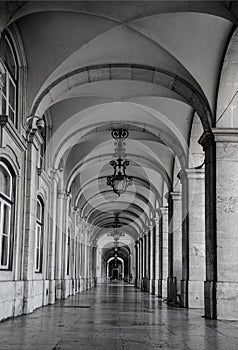 The arcades in Commerce square Praca do Comercio, in Lisbon, Portugal