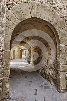 Arcades. Medieval village of Monells. Girona, Costa Brava. Catalunya. Spain photo