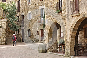 Arcades. Medieval village of Monells. Girona, Costa Brava. Catalunya. Spain photo