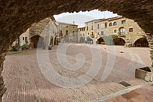 Arcades. Medieval village of Monells. Girona, Costa Brava. Catalunya. Spain photo