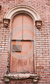 Arch above abandoned building window