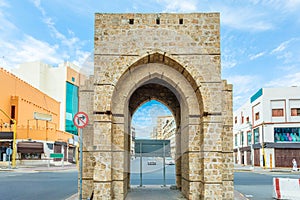 Arch of ancient Bab Sharif Gate on the street of Al-Balad, Jeddah, Saudi Arabia