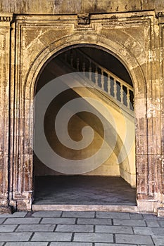 Arch with ancient moorish stucco work in Alhambra