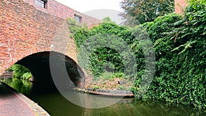 Arch brick bridge over canal