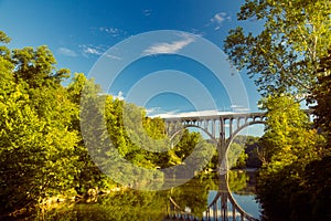 Arch bridge spanning a river in Cuyahoga Valley National Park