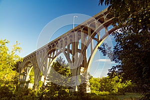 Arch bridge spanning a river in Cuyahoga Valley National Park