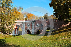 Arch bridge stands in Tsaritsyno park, beautiful architecture XVIII century