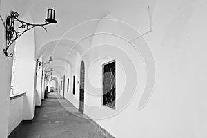 Arch of candlesticks at the castle. Black and white