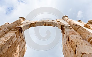 Arch and column in antique city of Gerasa Jerash