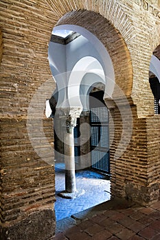 Arch and columns inside a Muslim mosque in Toledo photo