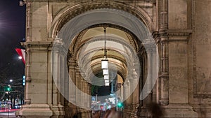 Arch with columns of Vienna Opera night timelapse.