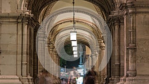 Arch with columns of Vienna Opera night timelapse.