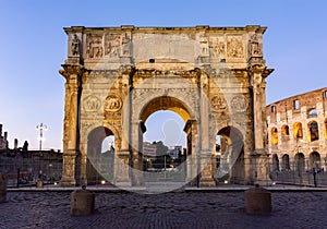 Arch of Constantine Arco di Constantino near Colloseum Coliseum at sunset, Rome, Italy photo
