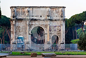 Arch of Constantine and coliseum in background at Rome, Italy