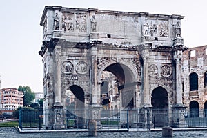 Arch of Constantine and coliseum in background at Rome, Italy