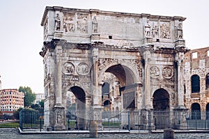 Arch of Constantine and coliseum in background at Rome, Italy