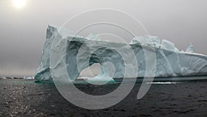 Arch of Darwin only unique glacier iceberg in ocean of Antarctica.