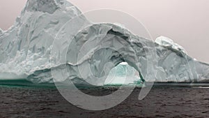 Arch of Darwin only unique glacier iceberg in ocean of Antarctica.