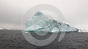 Arch of Darwin only unique glacier iceberg in ocean of Antarctica.