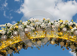 Arch, decorated with artificial flowers