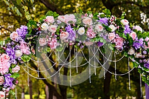 Arch decorated with lilac flowers