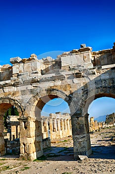 Arch of Domitian, at start of colonnaded street