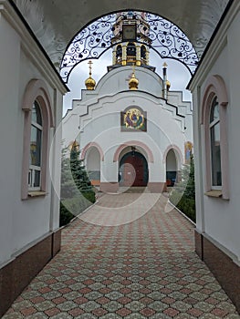 Arch entrance to the Holy Trinity Cathedral in Kramatorsk photo
